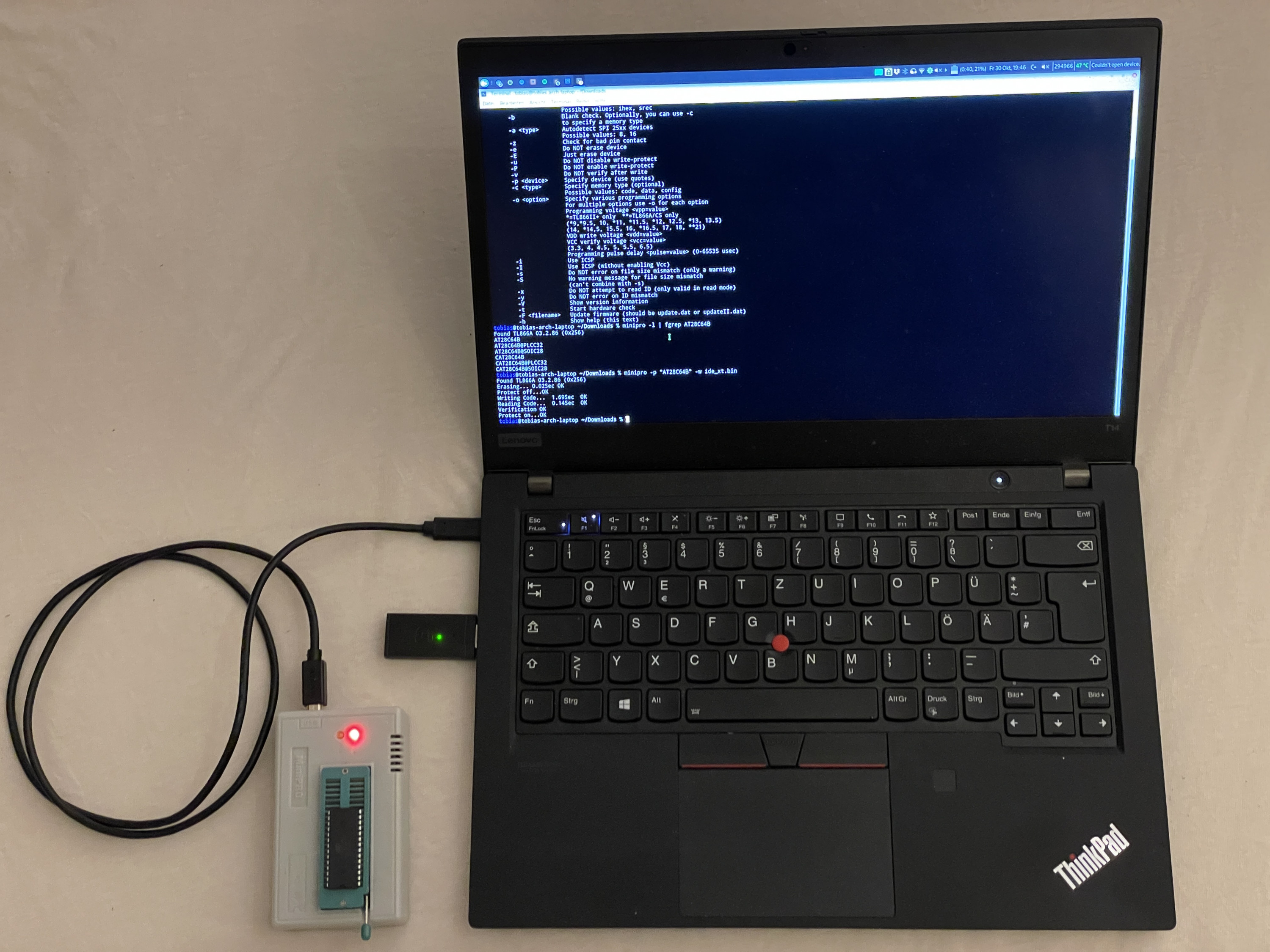 ThinkPad laptop with MiniPro TL866 programmer attached. DIP EEPROM is inserted in the programmer.