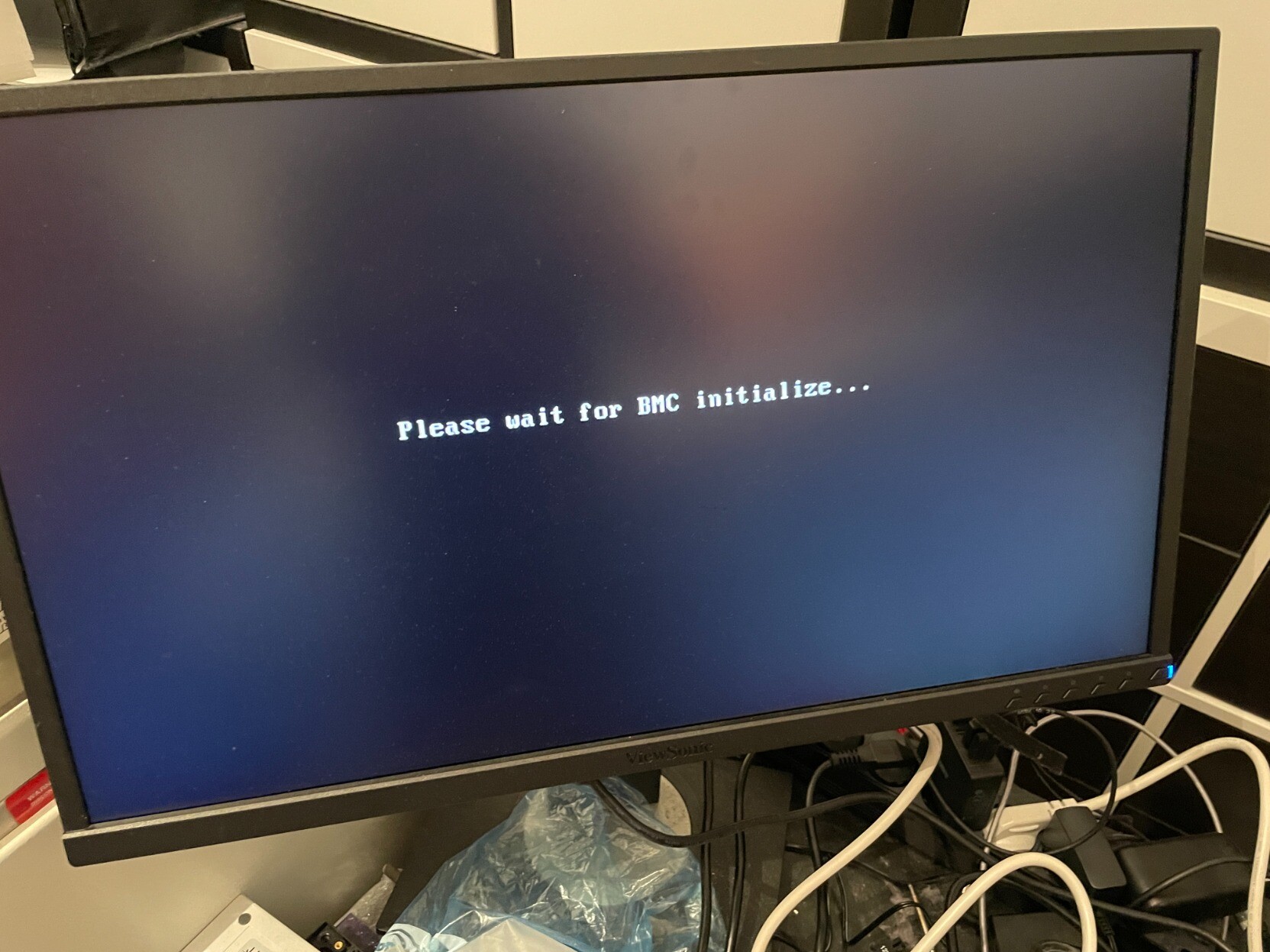 Monitor, showing Please wait for BMC initialize... message